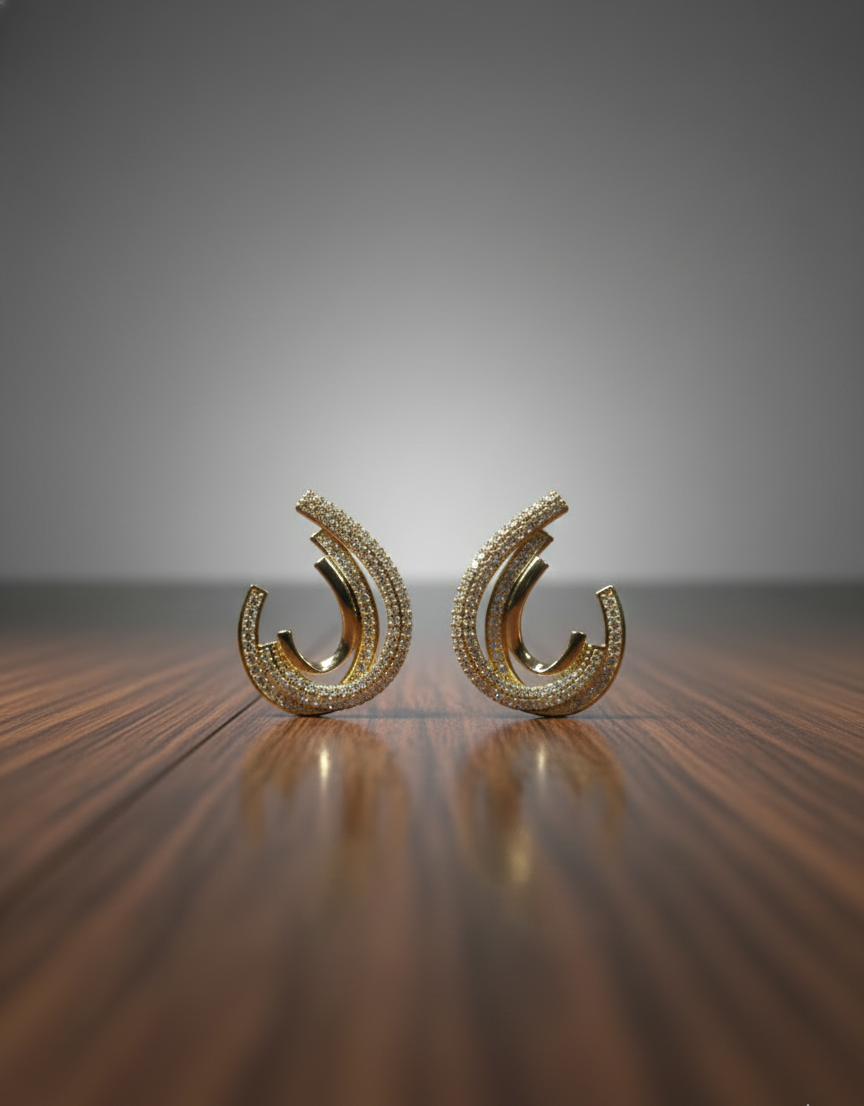 Golden Arc Statement Earrings – Where Movement Meets Modern Luxury